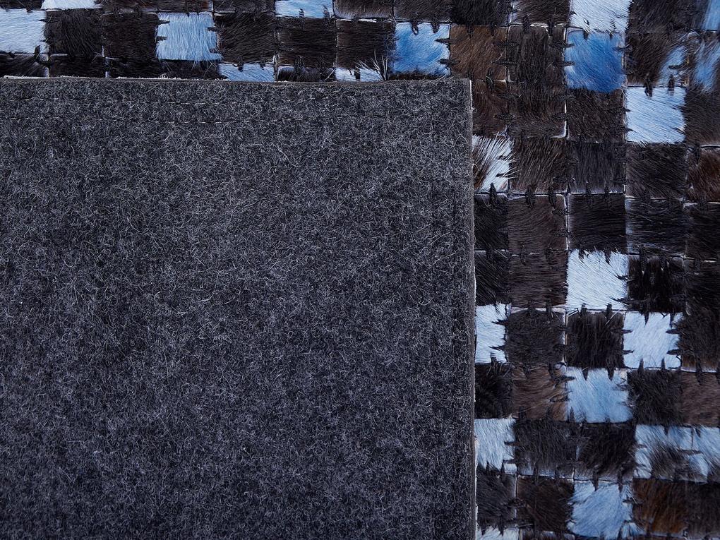 Kožený koberec 160 x 230 cm hnedá/modrá IKISU Beliani