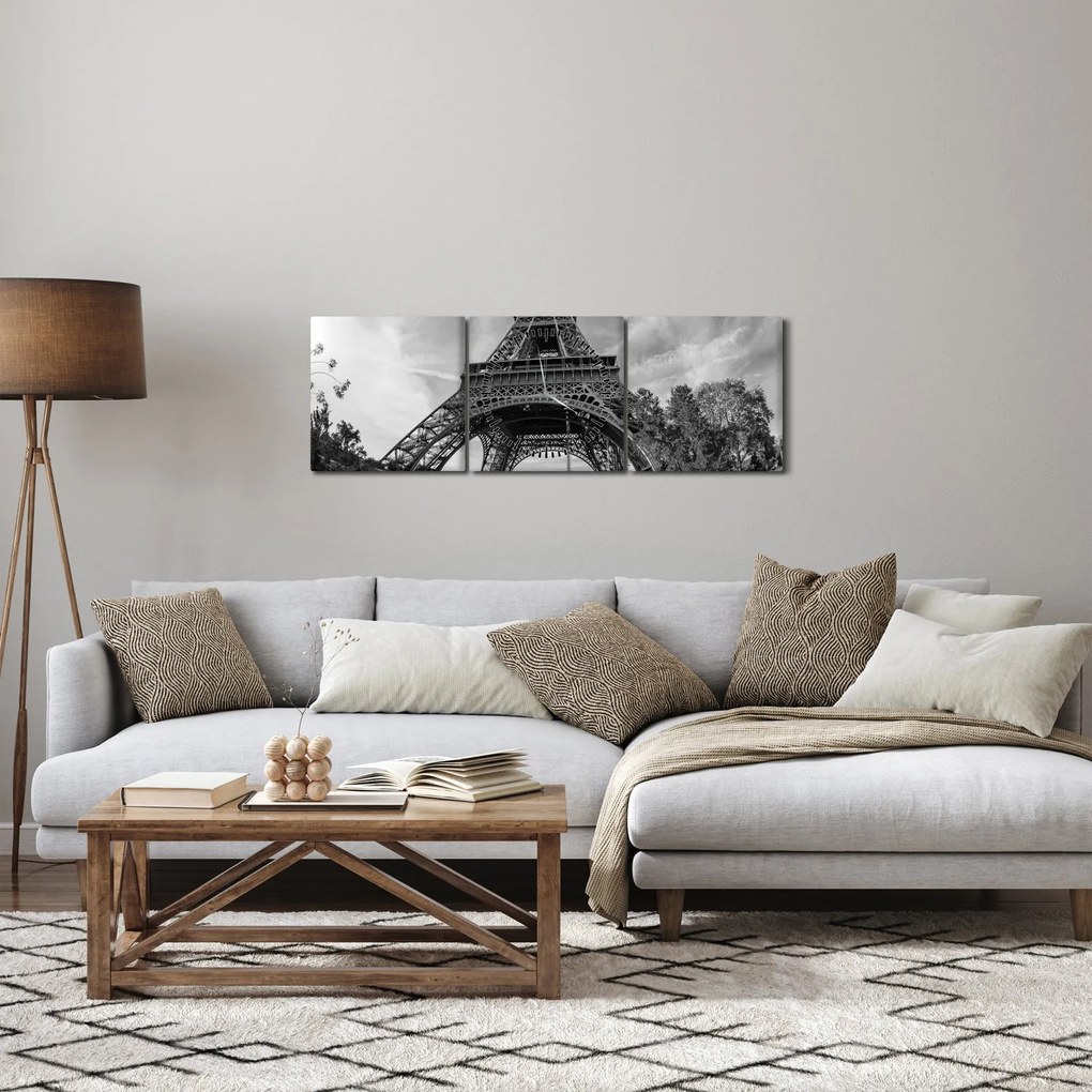 Obraz - Eiffelova veža, čiernobiela (s hodinami) (90x30 cm)