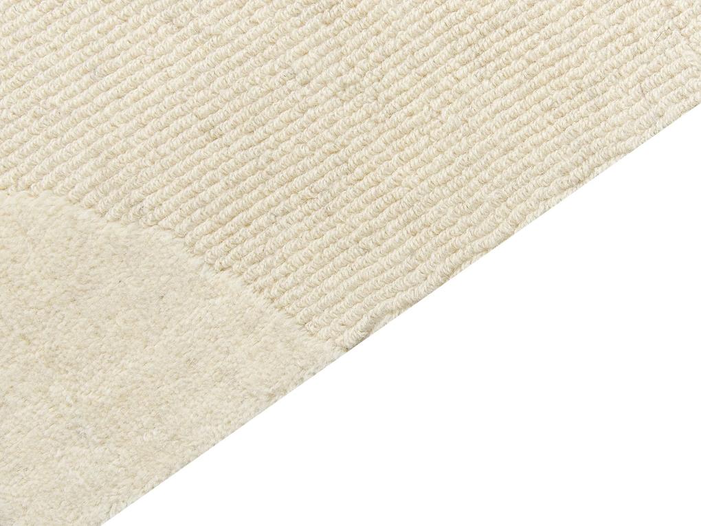 Vlnený koberec 160 x 230 cm béžový SASNAK Beliani
