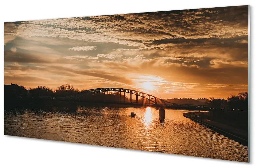 Obraz na akrylátovom skle Krakow river bridge sunset 140x70 cm