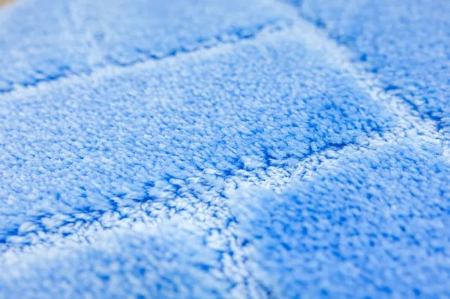 Kúpeľňový koberček Lotus modrý, tehla