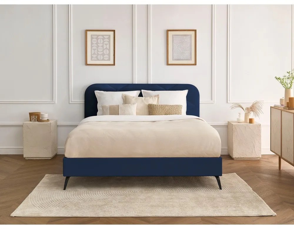 Tmavomodrá čalúnená dvojlôžková posteľ s roštom 180x200 cm Prune – Bobochic Paris