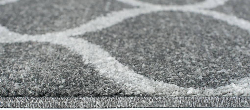 TA Koberec E665A TMAVOSIVÉ SARI BSF Rozmer: 70x300 cm