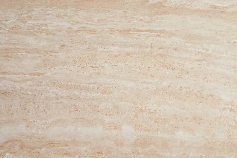 Dizajnový konferenčný stolík Danyale 80-134 cm travertín / šampanský