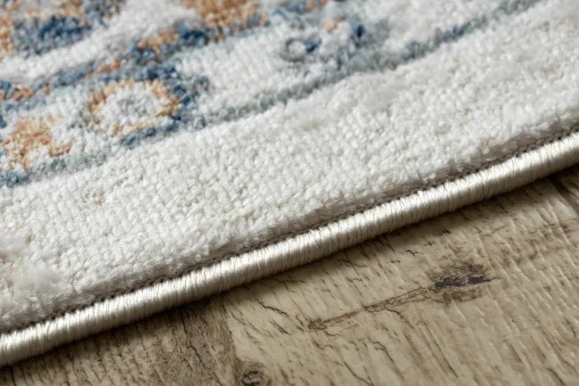 Koberec DISTIN 0834A tmavomodrá / modrá / žltá - ornament, vintage, strapce