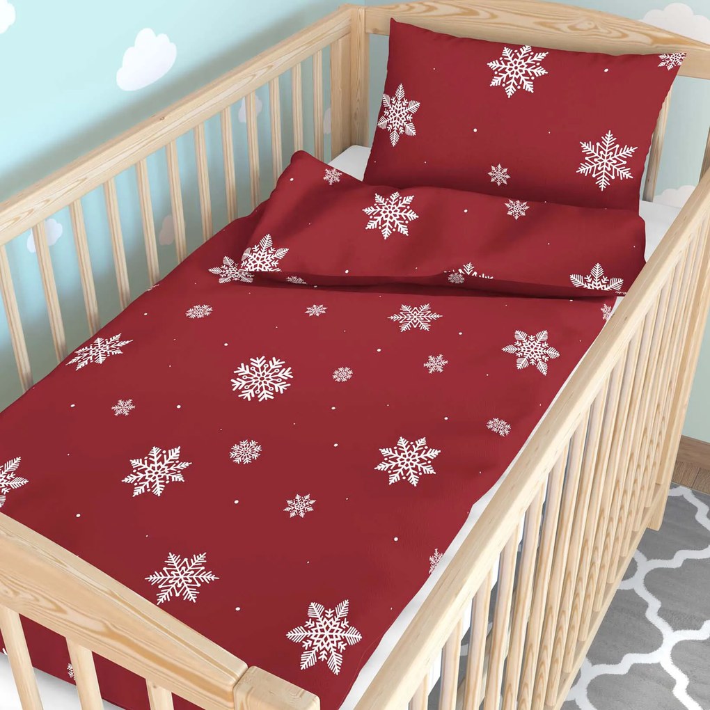 Goldea detské bavlnené obliečky do postieľky - snehové vločky na červenej 110 x 125 a 35 x 55 cm