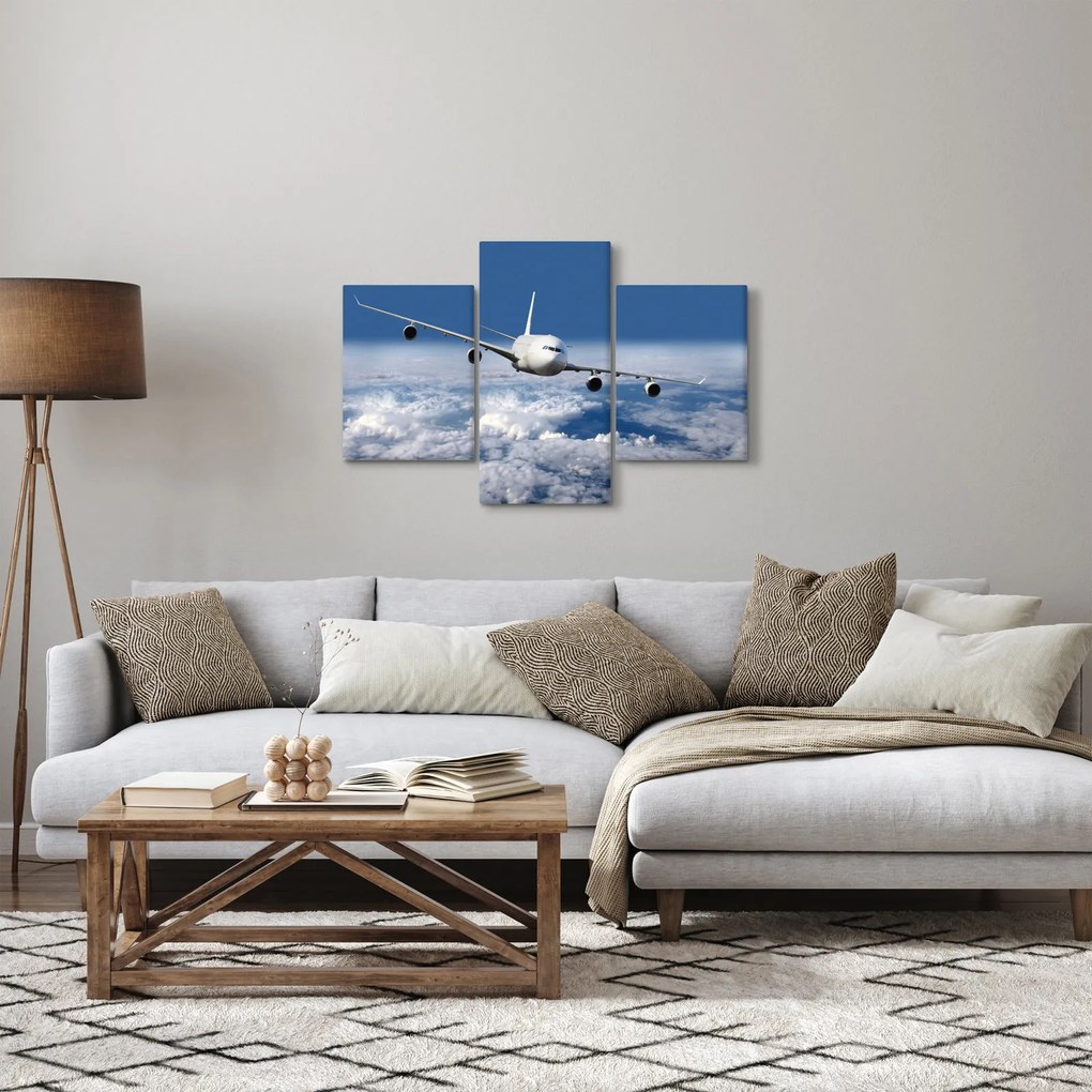 Obraz - Lietadlo v oblakoch (90x60 cm)