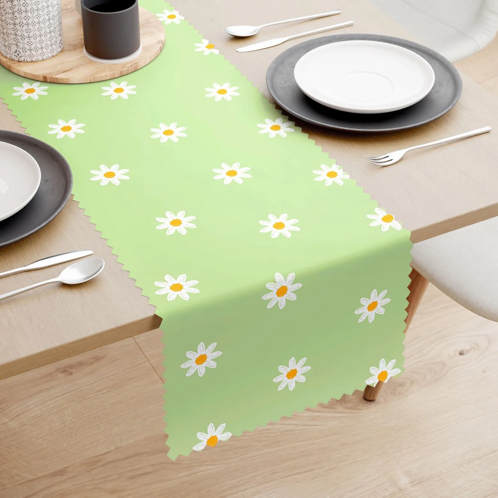 Goldea behúň na stôl teflónový - margarétky na zelenom 50x180 cm