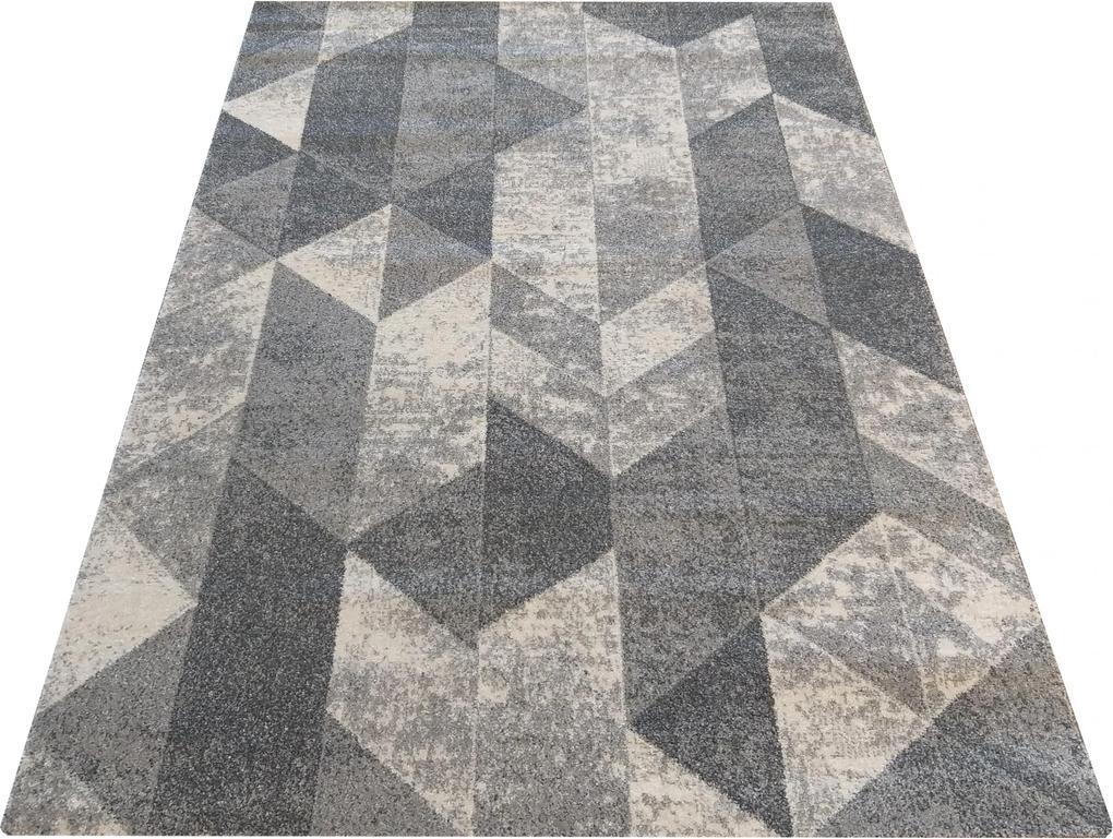 Sivý koberec s moderným vzorom
