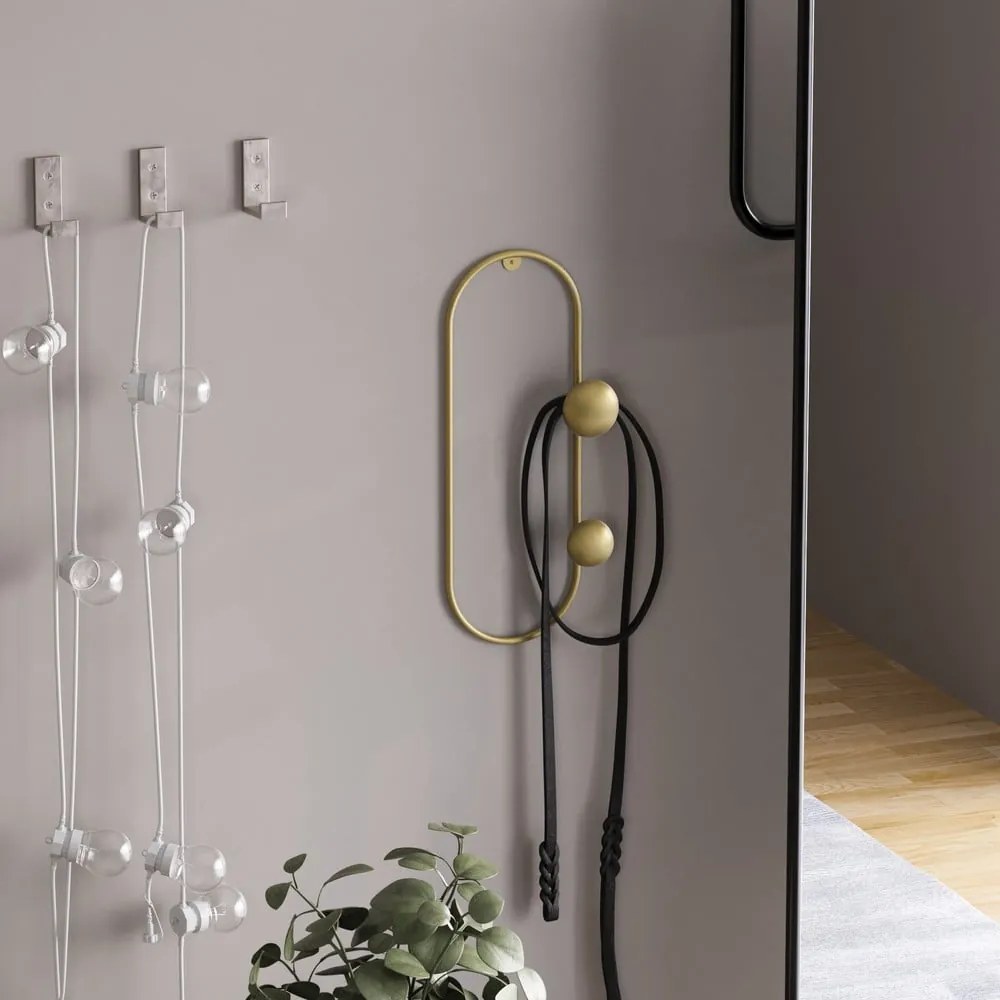 Kovový nástenný vešiak v zlatej farbe Dama – Kalune Design