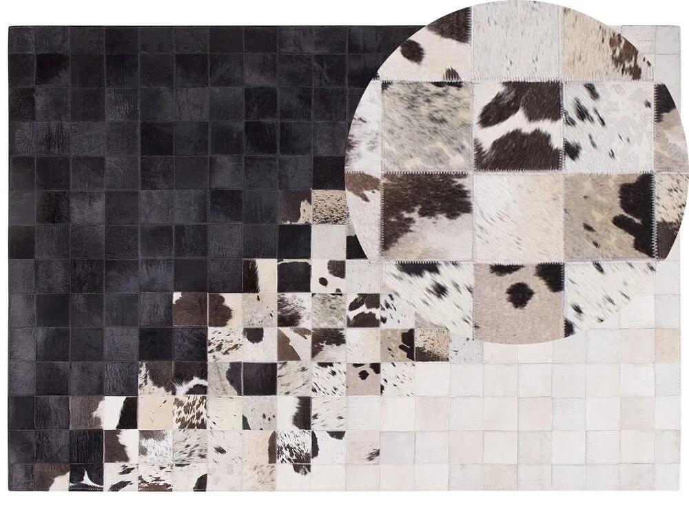Kožený koberec 160 x 230 cm čierna/biela KEMAH Beliani