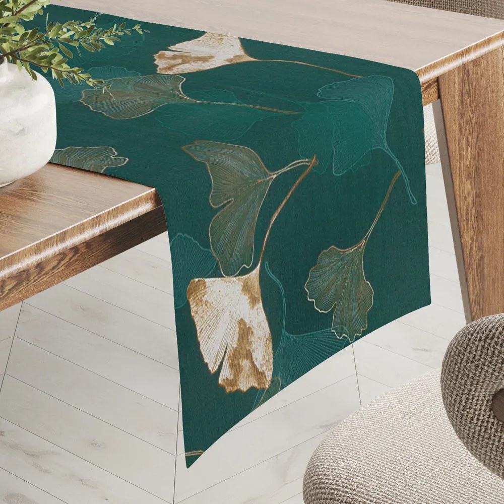 Biante Bavlnený behúň na stôl Sandra SA-428 Ginkgo listy na petrolejovom 45x140 cm