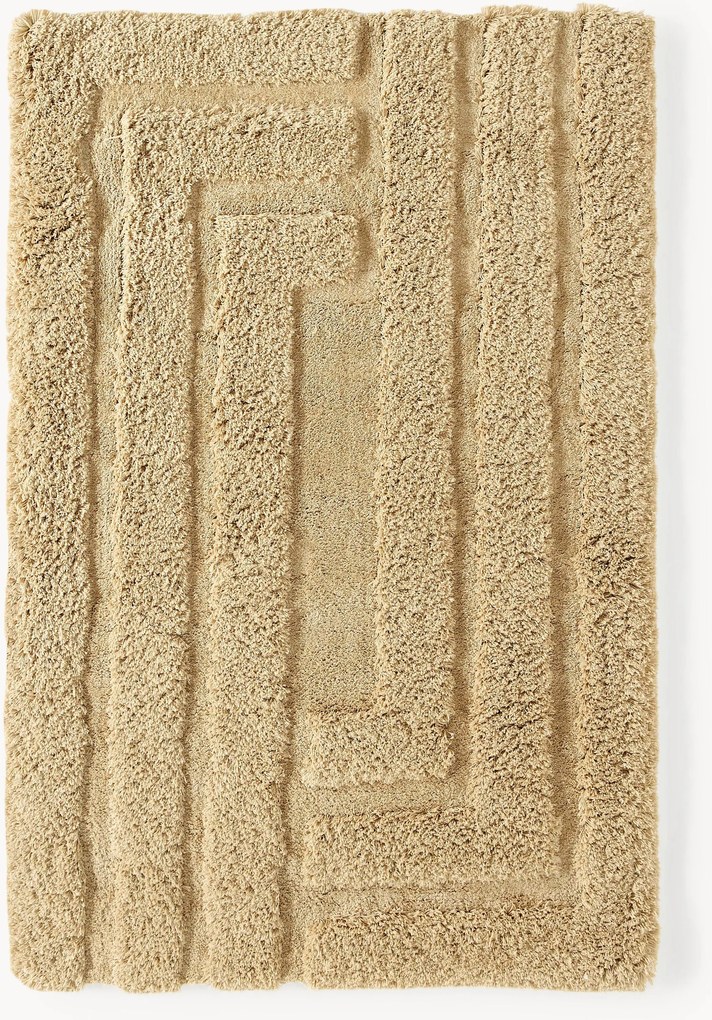 Koberec's vysokým vlasom a reliéfnou štruktúrou Genève