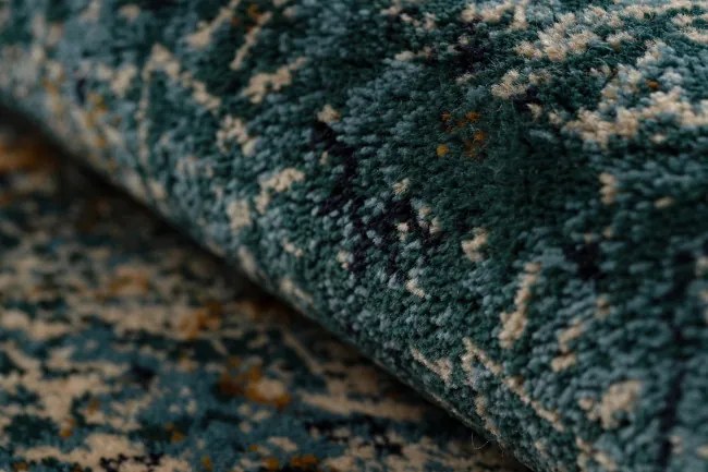 Koberec OMEGA MAMLUK tmavomodrý / hnedý kruh