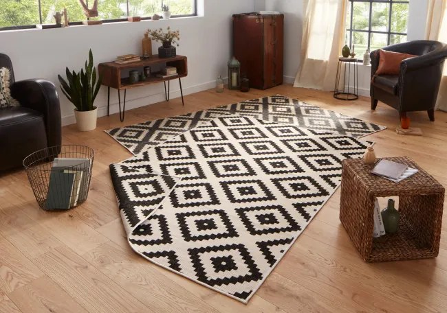 Obojstranný koberec Hanse Home Twin Malta čierny / krémový