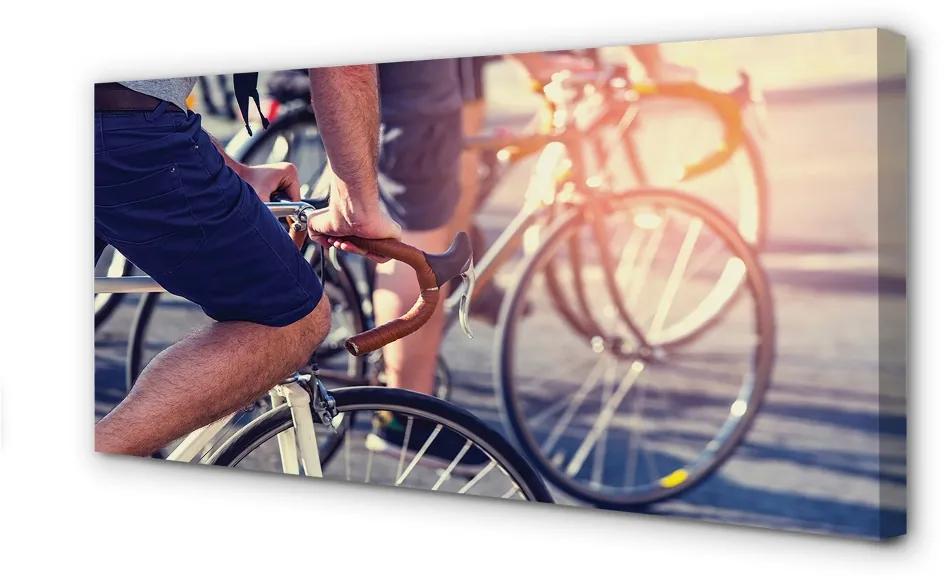 Obraz canvas cyklisti ľudí 125x50 cm