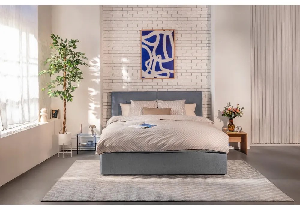 Modrá čalúnená dvojlôžková posteľ s úložným priestorom s roštom 180x200 cm Thessa Bold – Bonami Selection