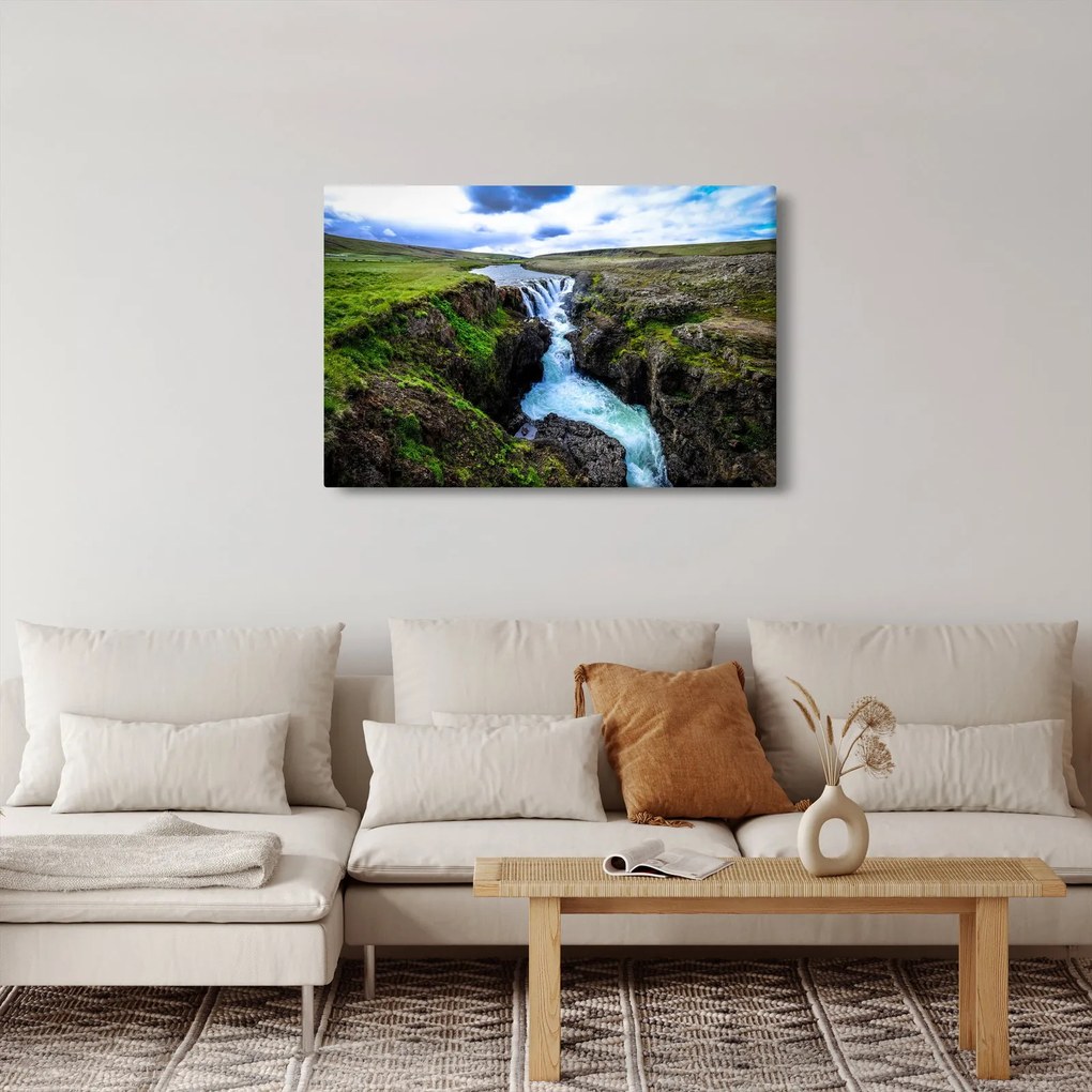 Obraz vodopádu medzi skalami (90x60 cm)