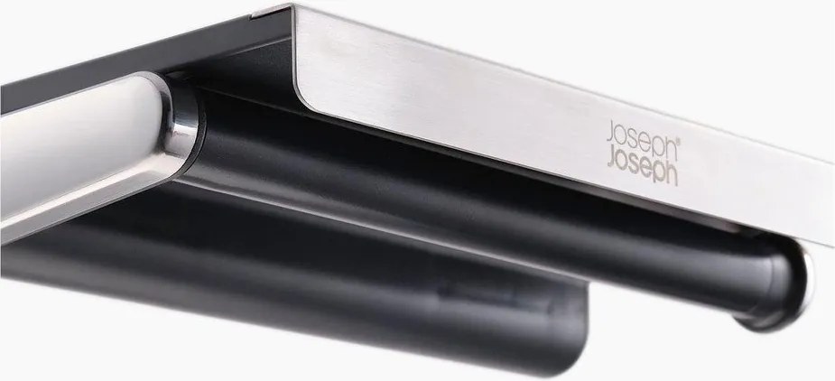 Nástenný plastový držiak na papierové utierky v striebornej farbe RollGrip – Joseph Joseph