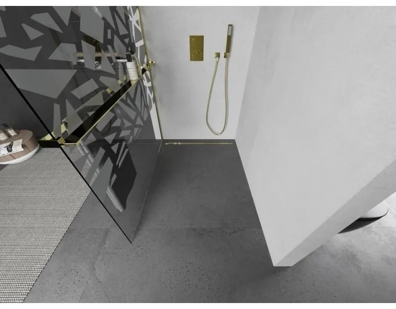 Mexen Kioto+ L, sprchová zástena Walk-In s poličkou a vešiakom 110 x 200 cm, 8mm číre sklo biely vzor, zlatý lesklý profil,800-110-123-50-85