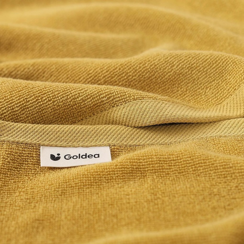 Goldea bavlnený froté uterák / osuška soft bez bordúry – horčicový 50 x 100 cm