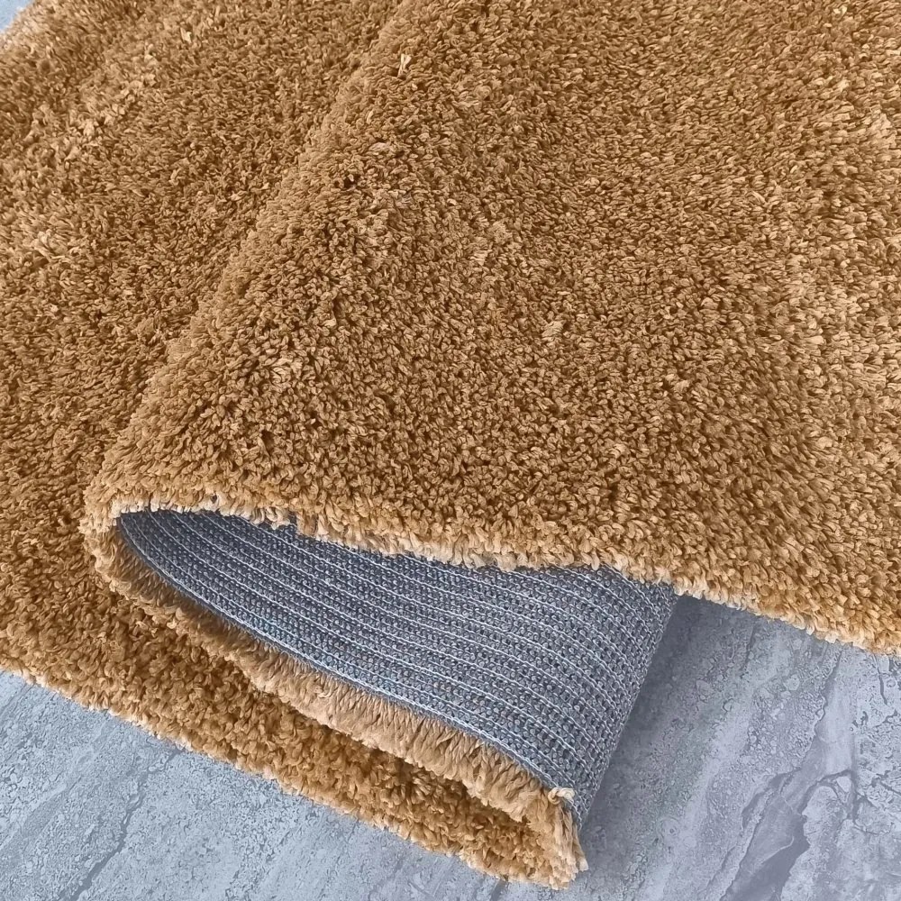 Moderný shaggy koberec v horčicovo žltej farbe Šírka: 80 cm | Dĺžka: 150 cm