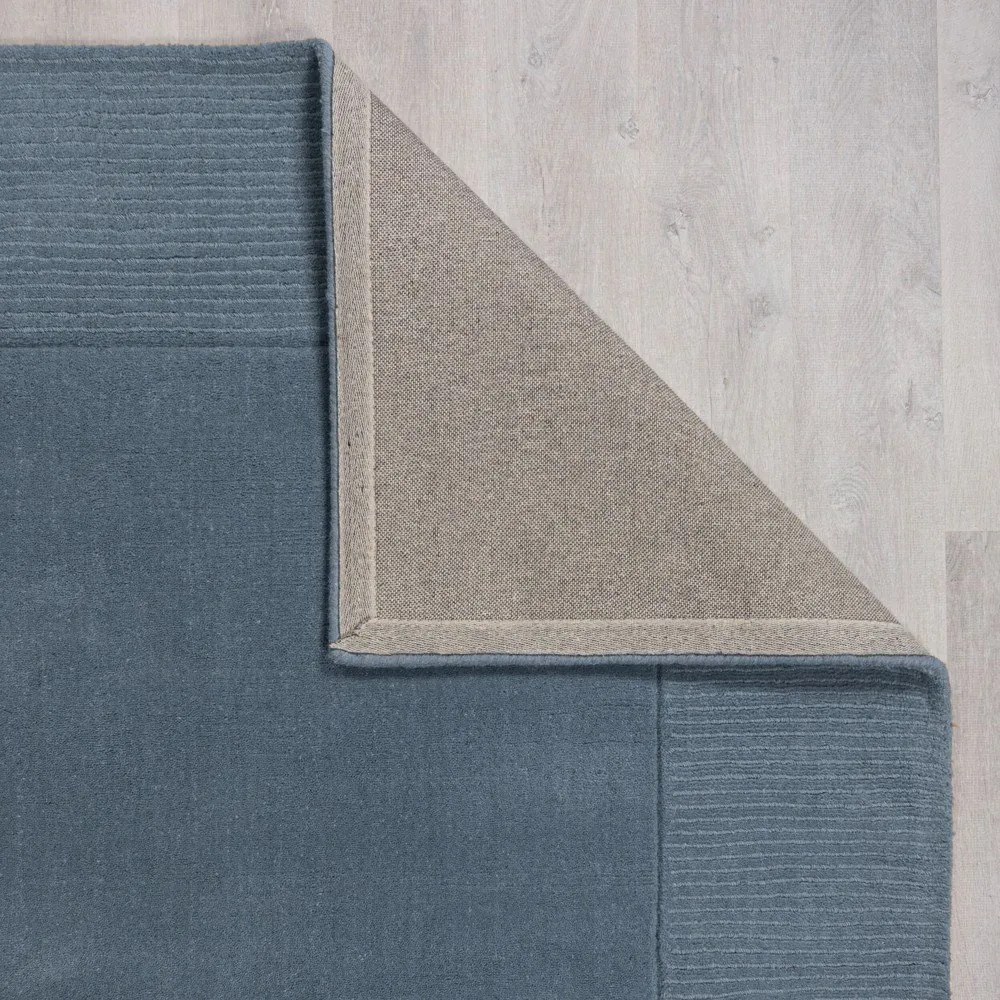 Tmavomodrý ručne tkaný vlnený koberec 200x290 cm Textured Wool Border – Flair Rugs