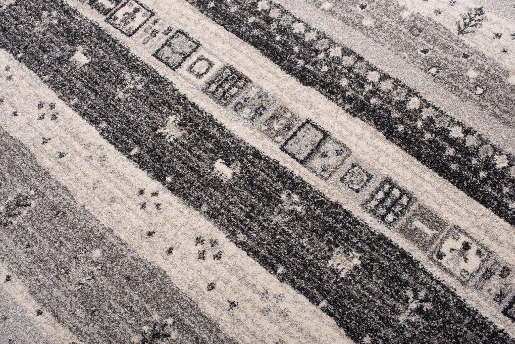 TA Koberec K203A TMAVOSIVÉ SARI B1X Rozmer: 120x170 cm