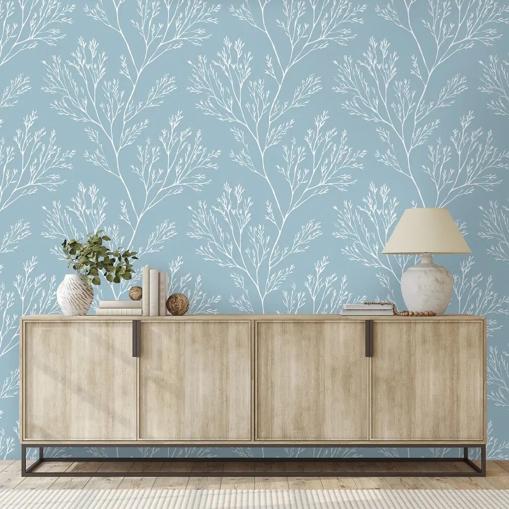 Fototapeta biele vetvičky na modrom pozadí