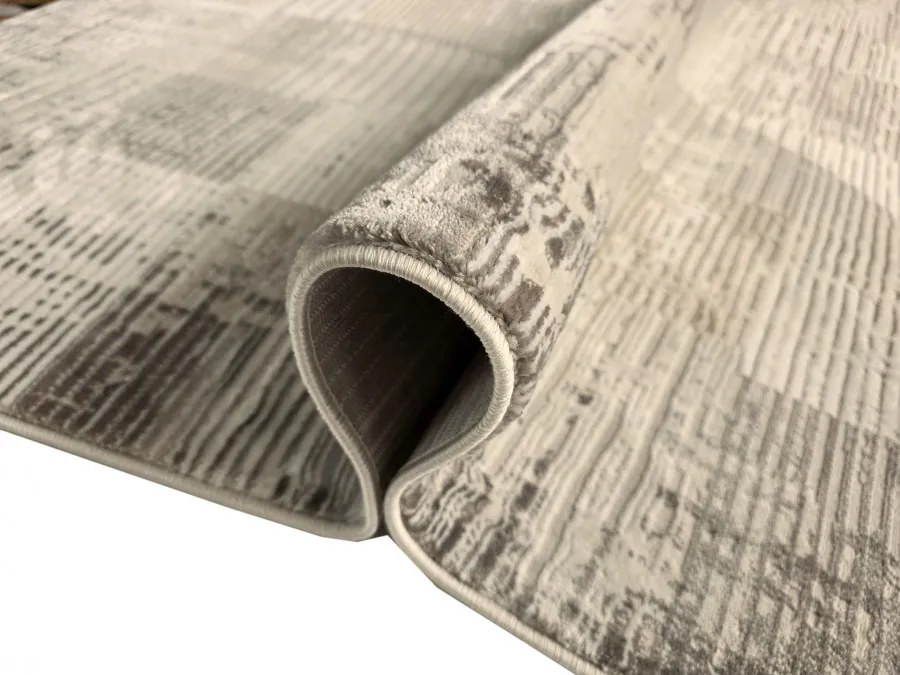 DC Koberec Oman 637 tmavá vizion zlatá Rozmer: 140×190 cm