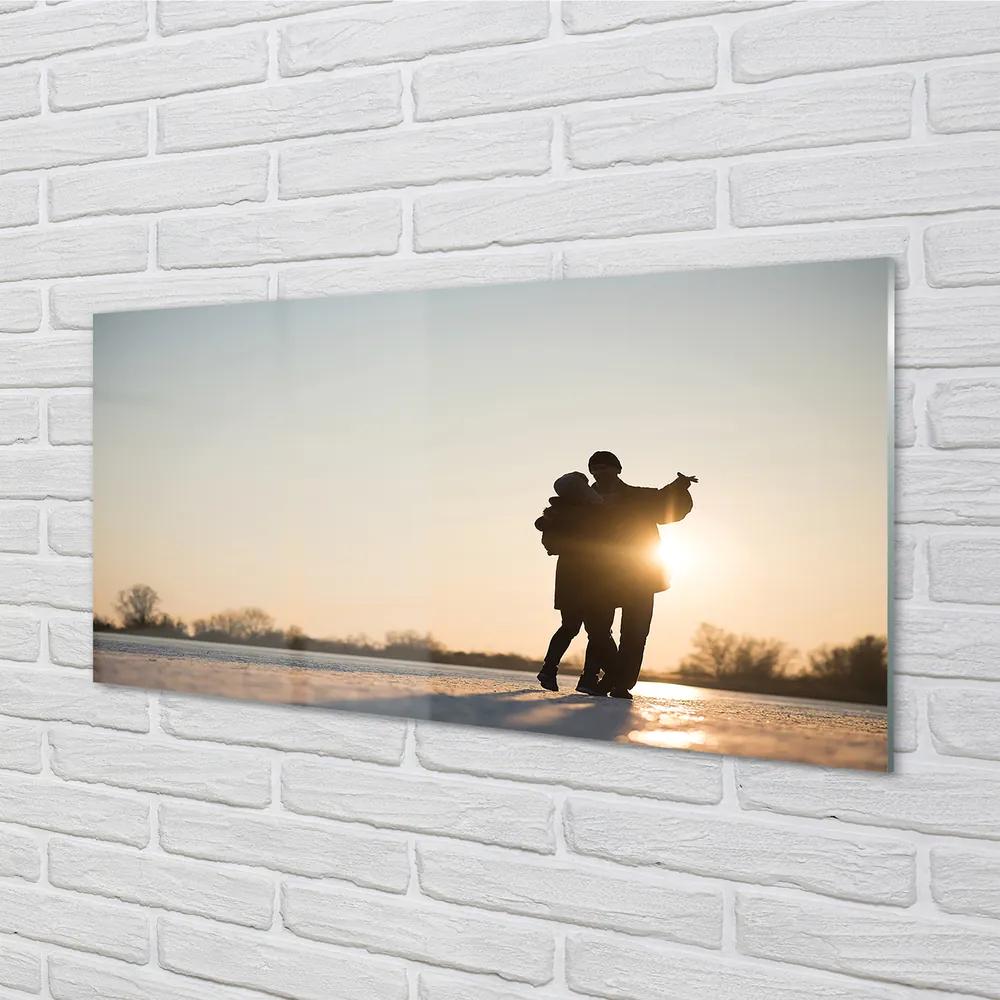 Obraz plexi Ľudia tancujú v zime 100x50 cm
