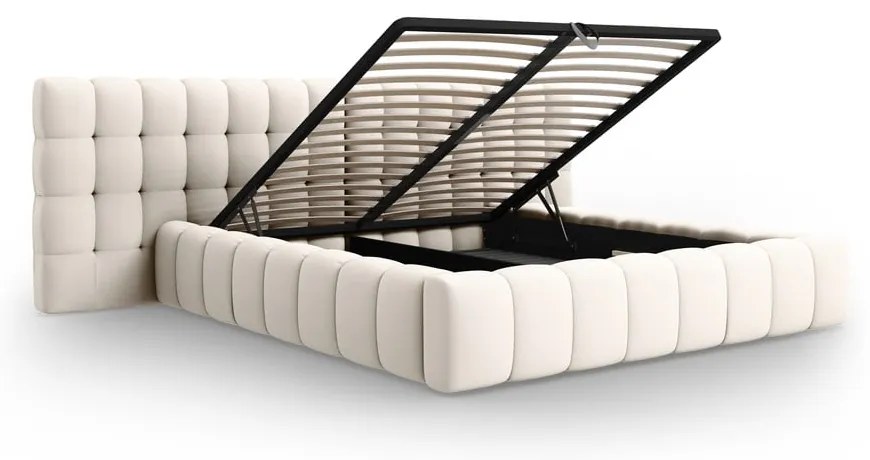 Krémová čalúnená dvojlôžková posteľ s úložným priestorom a roštom 180x200 cm Mamaia – Micadoni Home