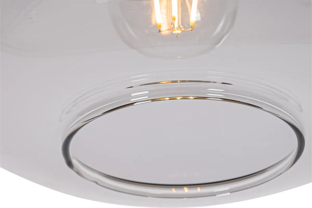 Dizajnové závesné svietidlo čierne so zlatom a dymovým sklom - Kyan