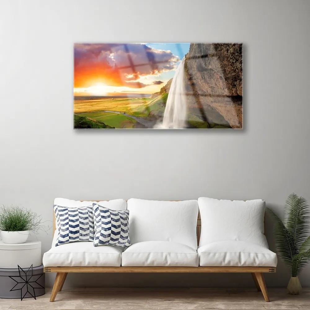 Skleneny obraz Vodopád slnko krajina 125x50 cm