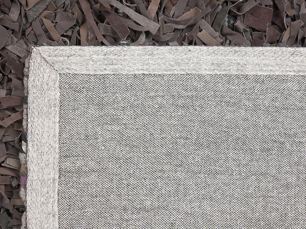Kožený koberec 160 x 230 cm tmavohnedý MUT Beliani