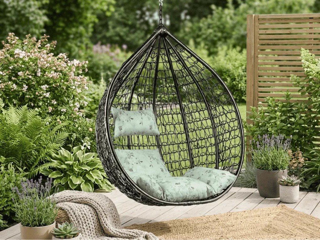 Čierne závesné kreslo KOKON bez stojanu, svetlozelený vankúš so vzorom