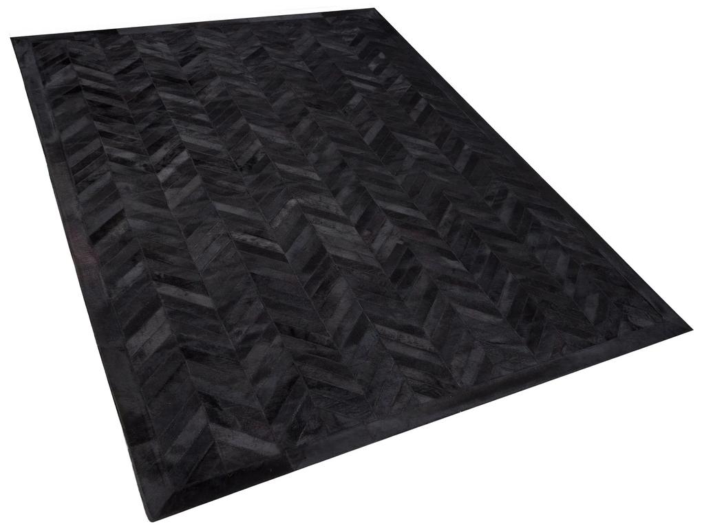 Kožený koberec 140 x 200 cm čierny BELEVI Beliani