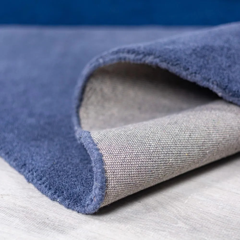 Modrý ručne tkaný vlnený okrúhly koberec ø 200 cm Mia Segment – Flair Rugs