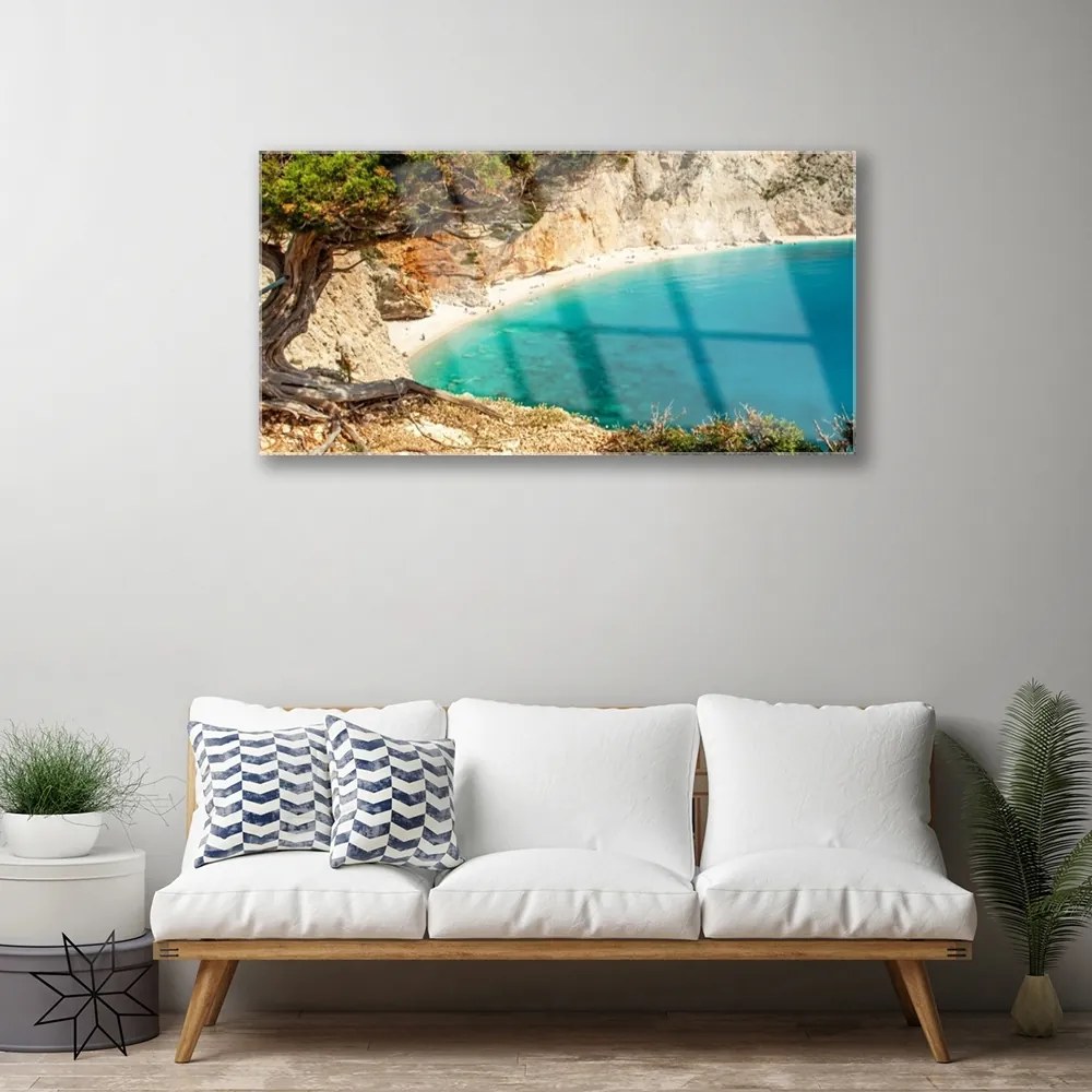 Skleneny obraz Záliv more skaly pláž 140x70 cm