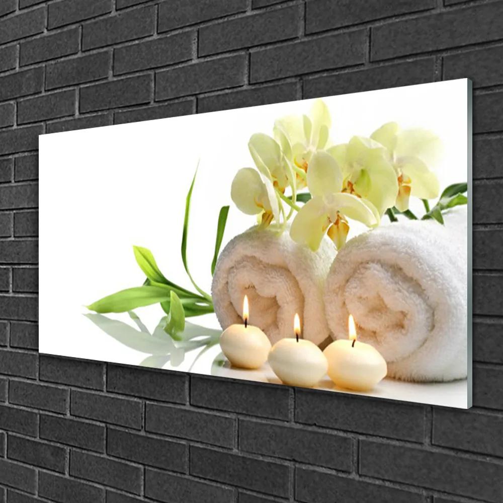 Skleneny obraz Kúpele uteráky sviece orchidea 100x50 cm