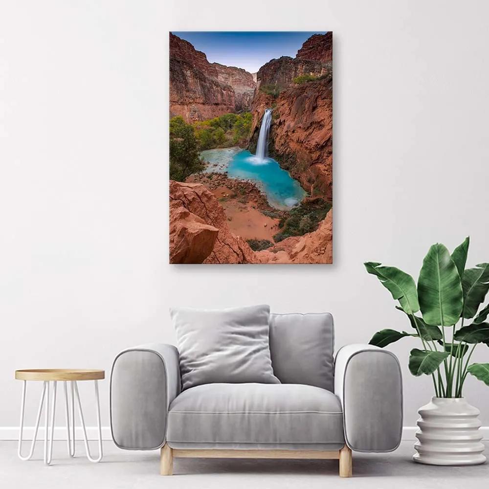 Gario Obraz na plátne Modrý vodopád medzi skalami Rozmery: 40 x 60 cm