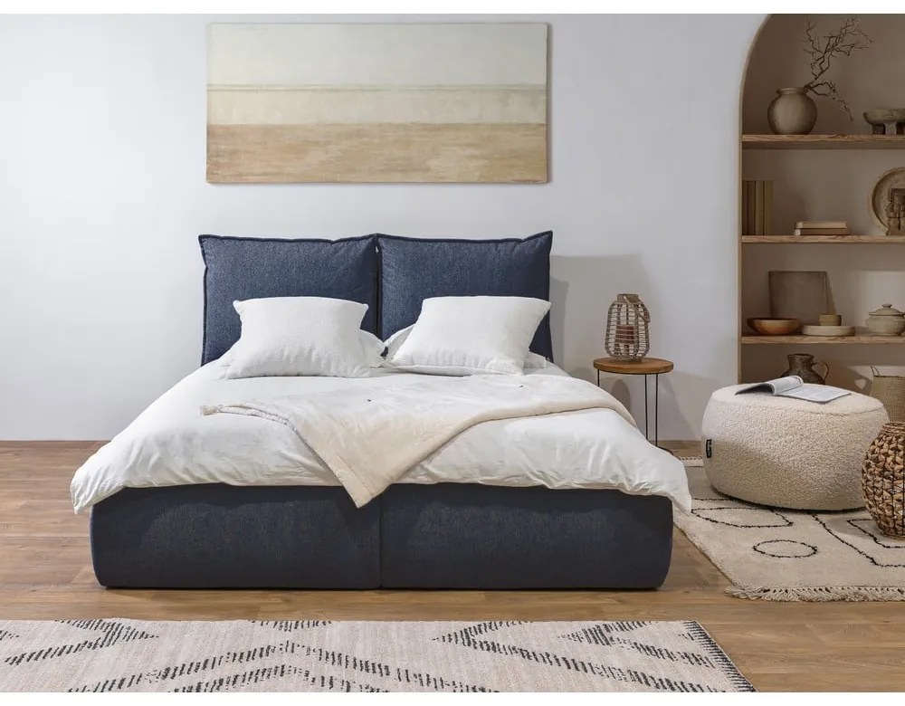 Tmavomodrá čalúnená dvojlôžková posteľ s úložným priestorom a roštom 180x200 cm Garancia – Bobochic Paris