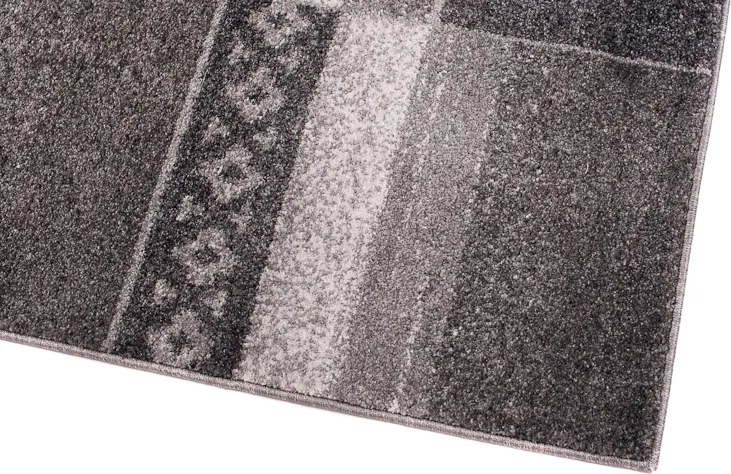 TA Koberec H077B TMAVOSIVÉ SARI BSF Rozmer: 240x330 cm