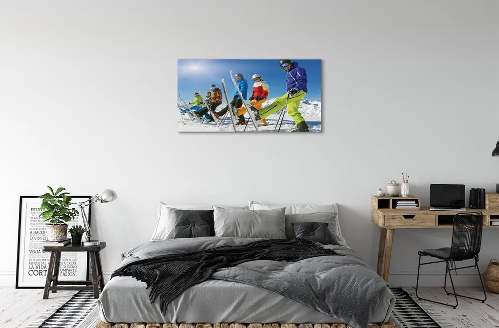 Obraz canvas Lyžiari zimné hory 120x60 cm