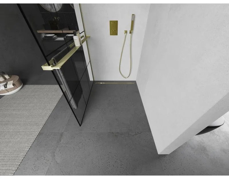 Mexen Kioto+ L, sprchová zástena Walk-In s poličkou a vešiakom 100 x 200 cm, 8mm číre sklo čierny vzor, zlatý matný profil, 800-100-123-55-77