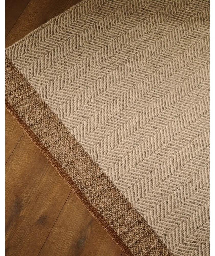 Béžový obojstranný ručne tkaný vlnený koberec 160x230 cm Nifelia – Kave Home