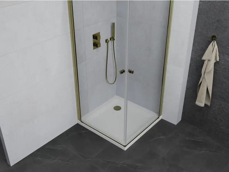 Mexen Pretoria Duo, sprchovací kút s 2-krídlovými dverami 80 (dvere) x 80 (dvere) cm, 6mm číre sklo, zlatý profil + slim sprchová vanička 5cm biela so zlatým sifónom, 852-080-080-50-02-4010G
