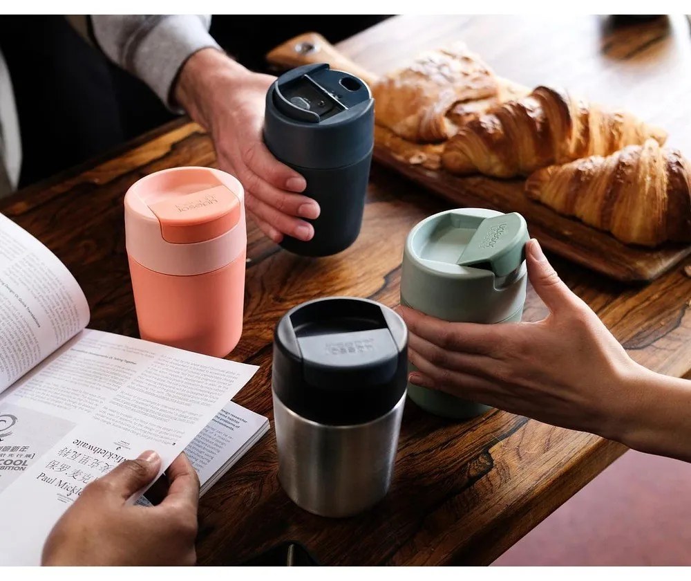 Oranžový cestovný hrnček 450 ml Sipp – Joseph Joseph