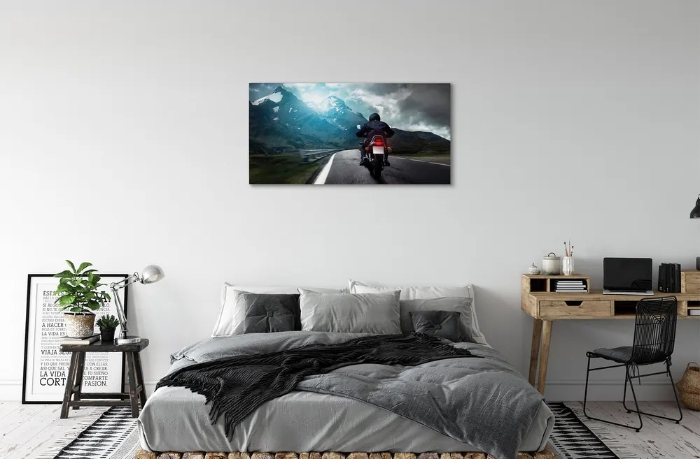 Obraz canvas Motocykla horskej ceste muž neba 125x50 cm
