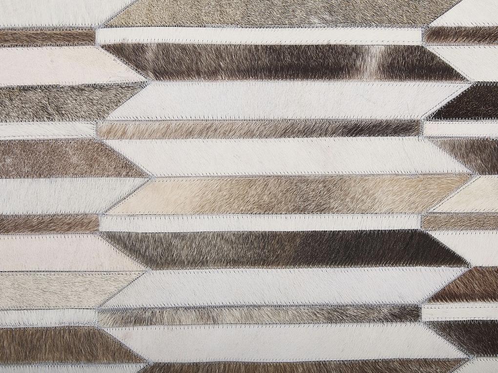 Kožený koberec 160 x 230 cm hnedá/béžová KULALAR Beliani